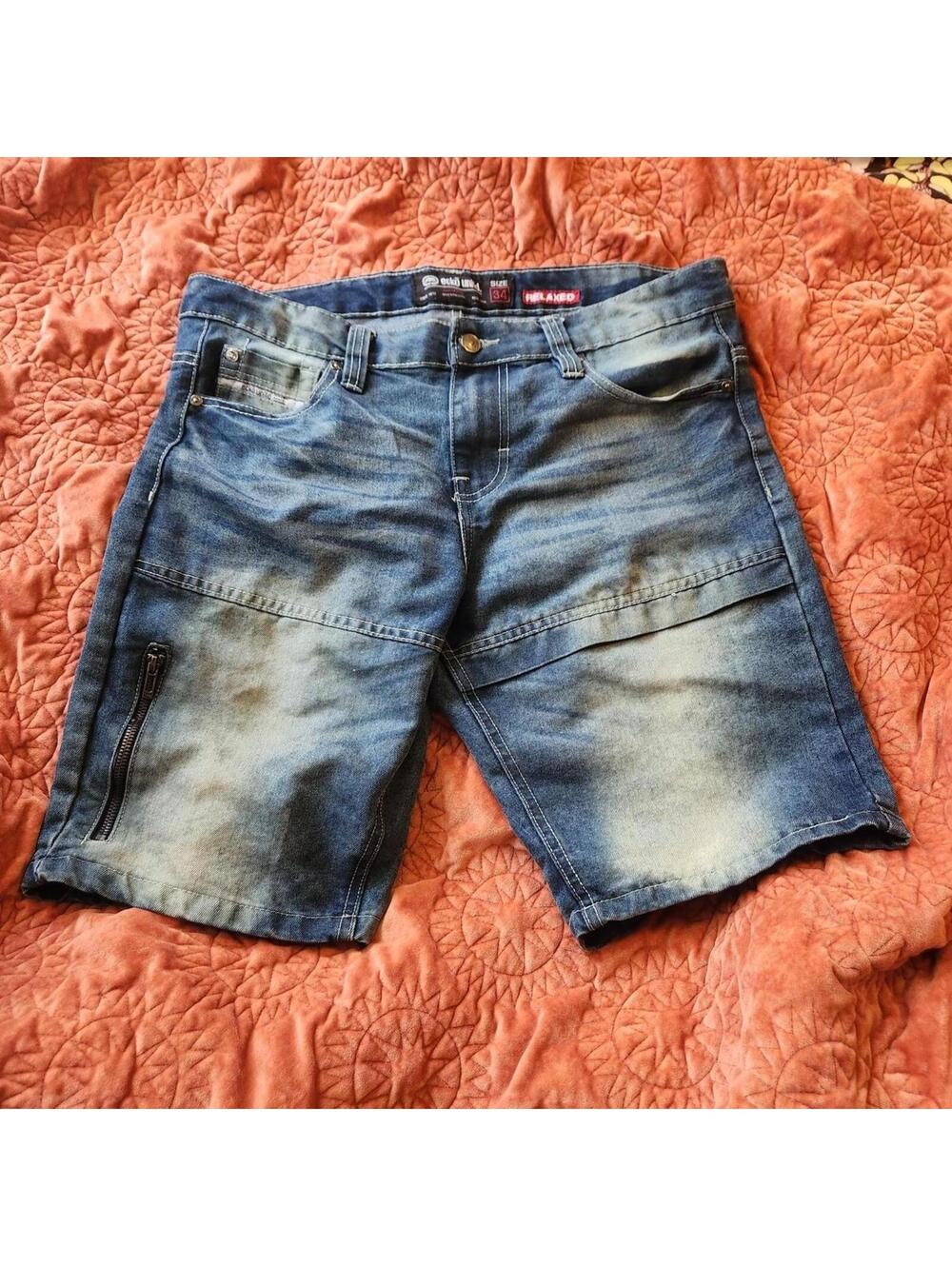 Vintage Y2K faded blue Ecko Unltd. distressed denim shorts with zippers